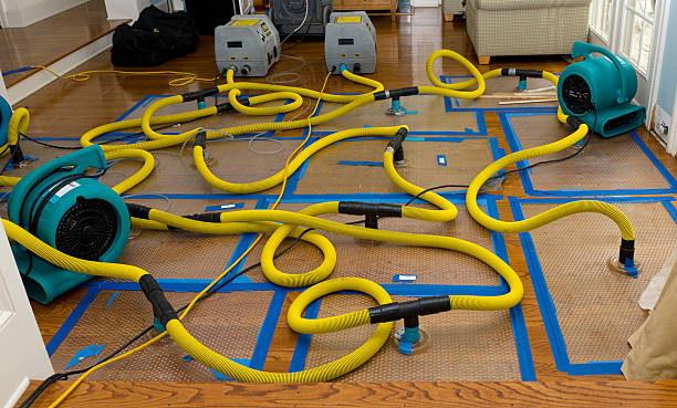 Professional Flood Damage Restoration technician working in Corinth, MS